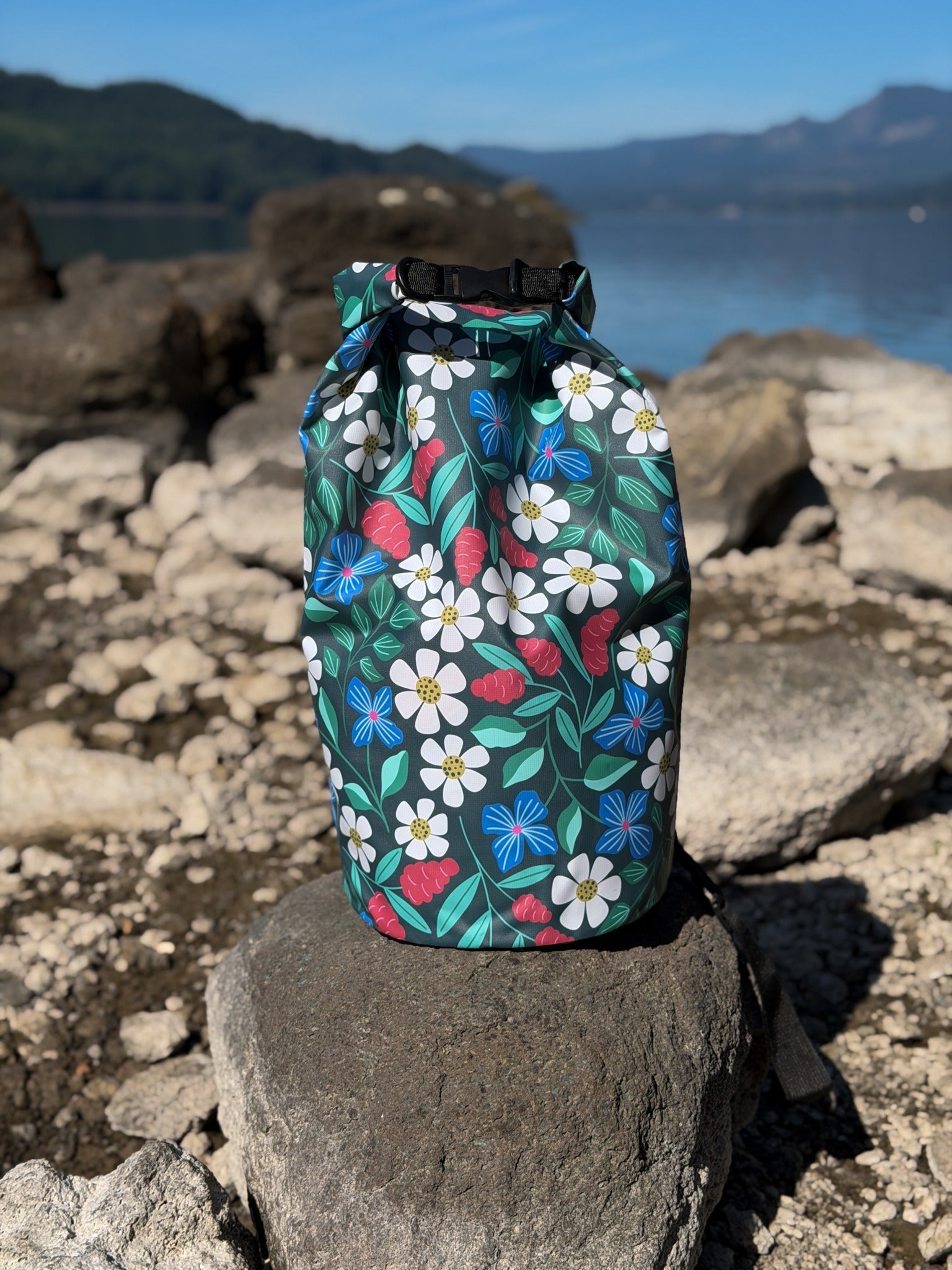Floral dry Bag on a rock by the river