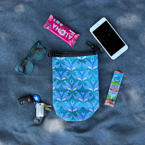 An image of the Yuba blue patterned roll-top waterproof dry bag from Wild Currents Co.