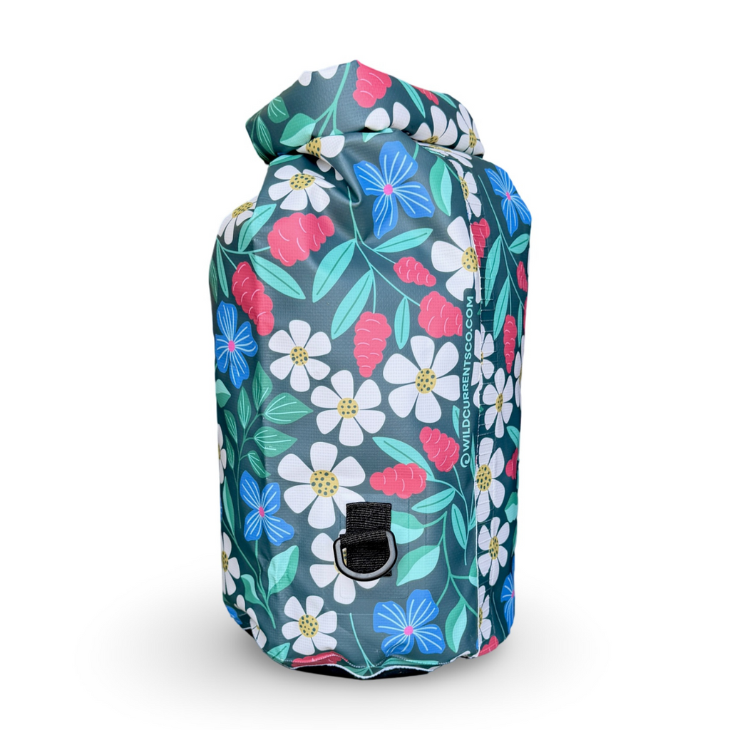 Back view of the floral 10L Waterproof Dry Bag showing the roll-top buckle closure and heavy-duty D-ring strap attachment point.