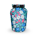 The compact Spaulding 10L waterproof dry bag with a vibrant green and teal floral pattern featuring white daisies, pink buds, and blue flowers, standing upright against a clean white background.