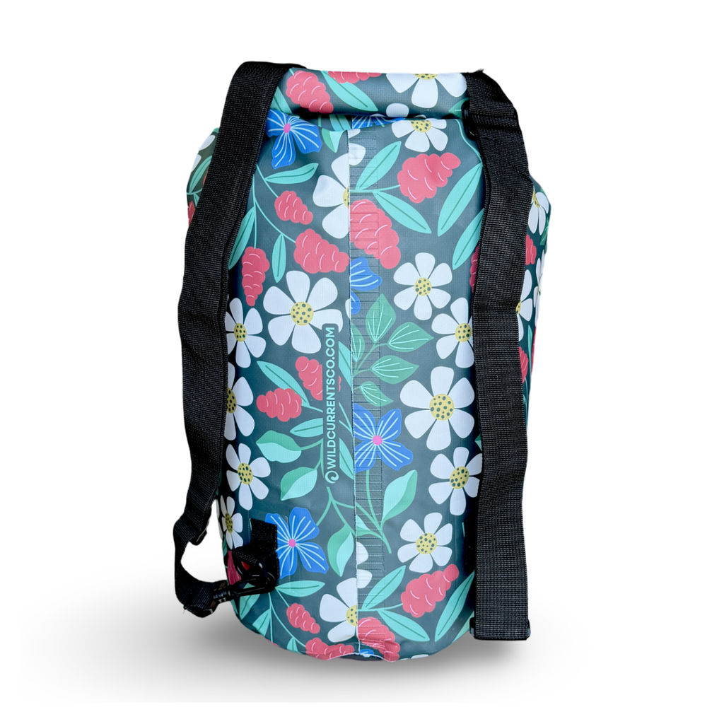 Rear studio shot of the floral pattern Spaulding 20L Waterproof Dry Bag against a white background, highlighting its dual black adjustable backpack straps designed for comfortable carrying during hiking, camping, and outdoor adventures.